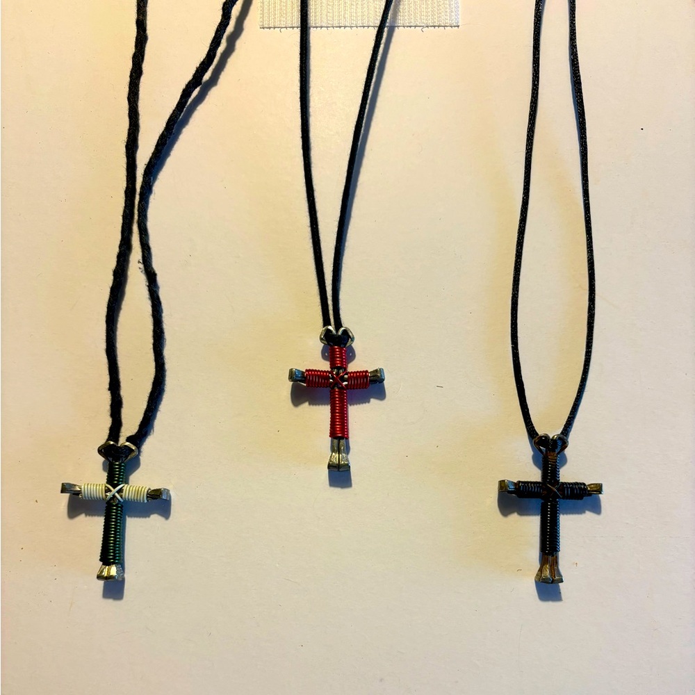Three handmade horse nail cross necklaces